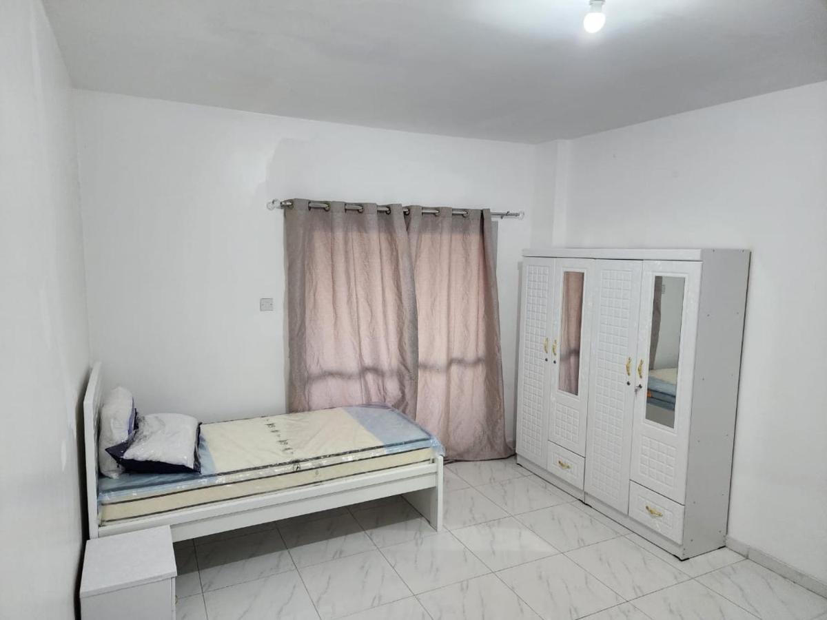 Sharing Motel Rooms Абу-Дабі Екстер'єр фото